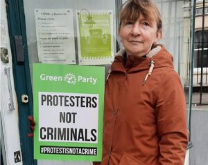 protestor outside Sheryll Murray's office