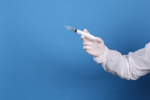 medic holding syringe