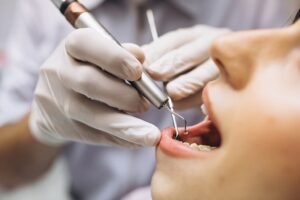 woman undergoing dental treatment