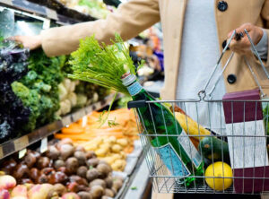 Woman choosing fresh veg